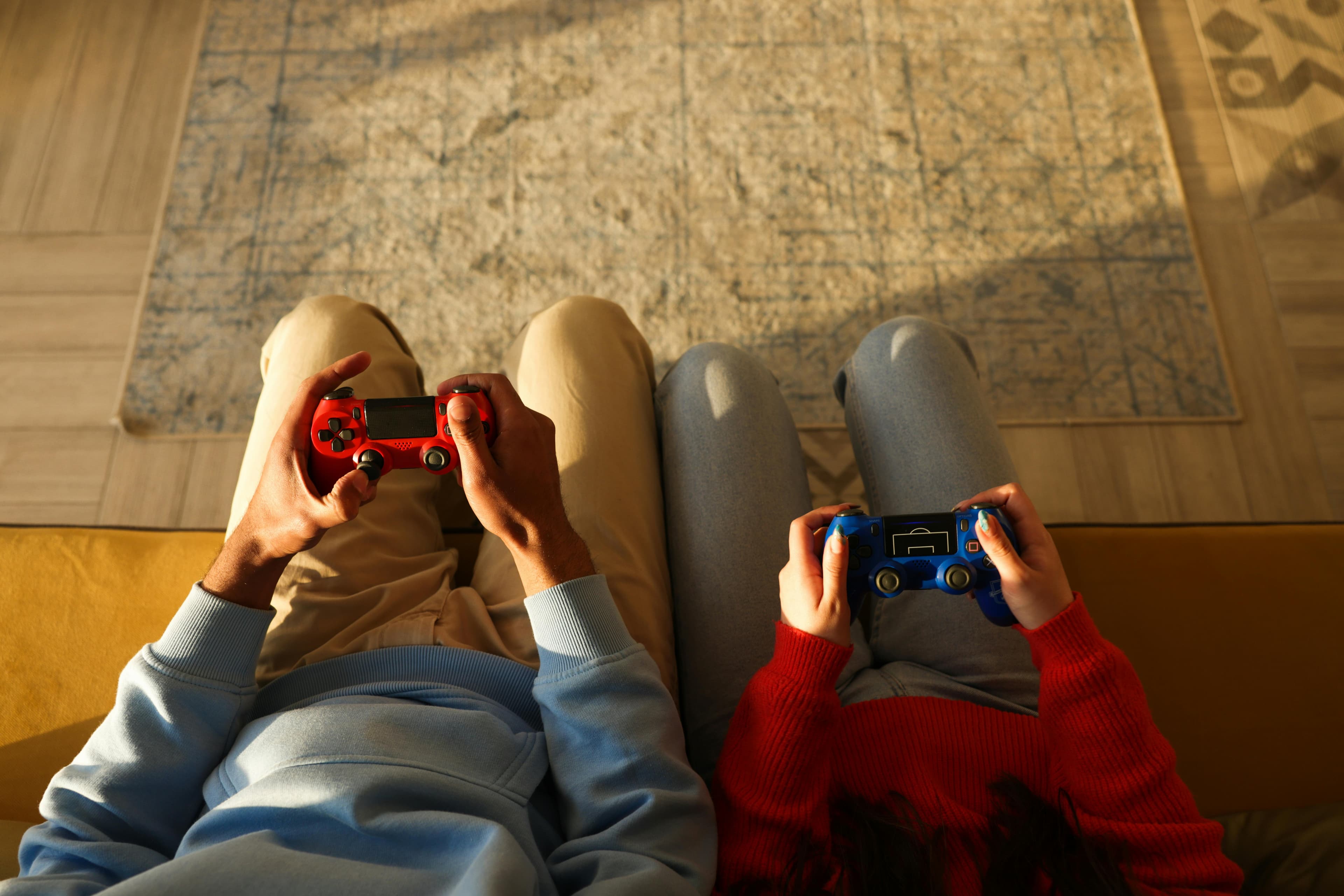 A relaxed gaming setup with soft warm lighting.